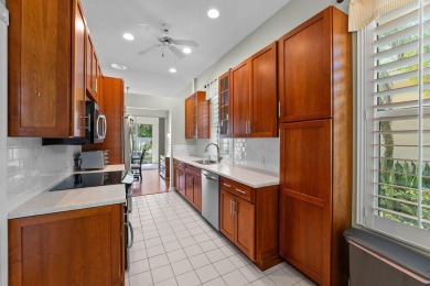 Luxurious Lakefront Living in The Meadows of Palm City! Enjoy on Monarch Country Club in Florida - for sale on GolfHomes.com, golf home, golf lot