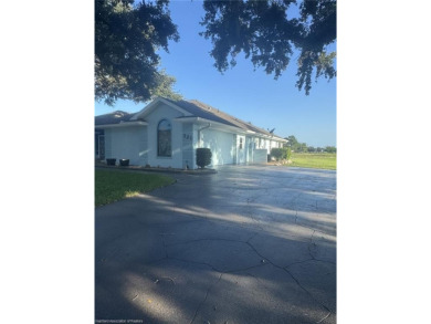 Welcome to this beautifully maintained 4-bedroom, 3-bath on  in Florida - for sale on GolfHomes.com, golf home, golf lot