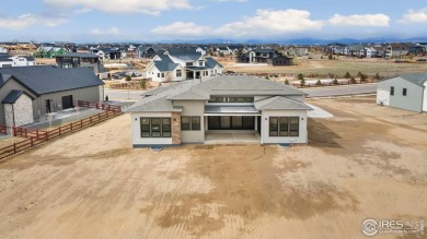 New home by Trumark on a beautiful one-acre homesite! Voluminous on Raindance National Golf Course in Colorado - for sale on GolfHomes.com, golf home, golf lot