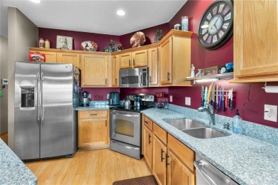 Welcome to this exceptional end-unit townhome that stands out on Oak Marsh Golf Club in Minnesota - for sale on GolfHomes.com, golf home, golf lot