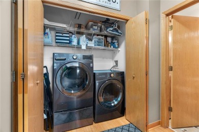 Welcome to this exceptional end-unit townhome that stands out on Oak Marsh Golf Club in Minnesota - for sale on GolfHomes.com, golf home, golf lot