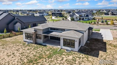 New home by Trumark on a beautiful one-acre homesite! Voluminous on Raindance National Golf Course in Colorado - for sale on GolfHomes.com, golf home, golf lot