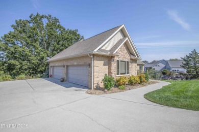 Golf course views, sun-filled rooms, and a massive 23x43 4-car on Tellico Village -The Links At Kahite Golf Course in Tennessee - for sale on GolfHomes.com, golf home, golf lot