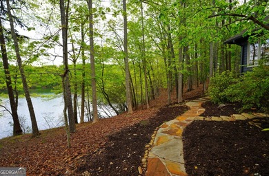 OVER 550 FEET OF SHORELINE! This is a fabulous opportunity to on Big Canoe Golf Club - Cherokee in Georgia - for sale on GolfHomes.com, golf home, golf lot