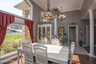 Golf course views, sun-filled rooms, and a massive 23x43 4-car on Tellico Village -The Links At Kahite Golf Course in Tennessee - for sale on GolfHomes.com, golf home, golf lot