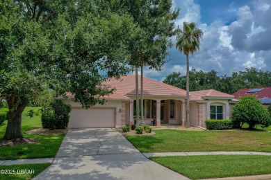This beautifully maintained 4-bedroom, 3-bathroom pool home on on The Club At Pelican Bay - North Course in Florida - for sale on GolfHomes.com, golf home, golf lot
