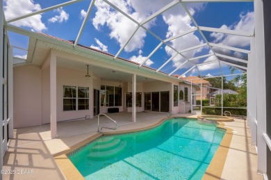 This beautifully maintained 4-bedroom, 3-bathroom pool home on on The Club At Pelican Bay - North Course in Florida - for sale on GolfHomes.com, golf home, golf lot