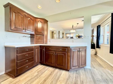 Welcome to your dream home in Eaton! This stunning 4-bedroom on Eaton Country Club in Colorado - for sale on GolfHomes.com, golf home, golf lot