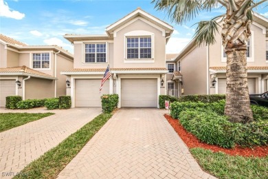 Welcome to your dream waterfront carriage home in the on Colonial Country Club in Florida - for sale on GolfHomes.com, golf home, golf lot