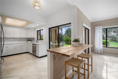 Experience the ultimate Pelican Bay lifestyle in this on Club at Pelican Bay Golf Course in Florida - for sale on GolfHomes.com, golf home, golf lot