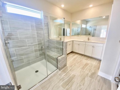 MOVE IN READY-FINISHED BASEMENT AND UPPER LEVEL!  Photos are of on Plantation Lakes Golf and Country Club in Delaware - for sale on GolfHomes.com, golf home, golf lot