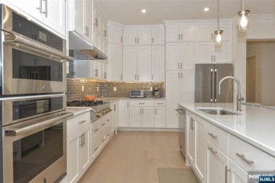 Experience refined living in this luxurious top-floor Cottage at on Edgewood Country Club in New Jersey - for sale on GolfHomes.com, golf home, golf lot
