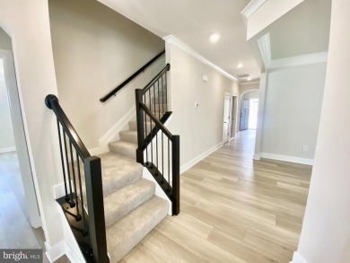 MOVE IN READY-FINISHED BASEMENT AND UPPER LEVEL!  Photos are of on Plantation Lakes Golf and Country Club in Delaware - for sale on GolfHomes.com, golf home, golf lot