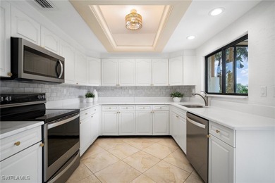 Experience the ultimate Pelican Bay lifestyle in this on Club at Pelican Bay Golf Course in Florida - for sale on GolfHomes.com, golf home, golf lot