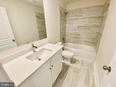MOVE IN READY-FINISHED BASEMENT AND UPPER LEVEL!  Photos are of on Plantation Lakes Golf and Country Club in Delaware - for sale on GolfHomes.com, golf home, golf lot