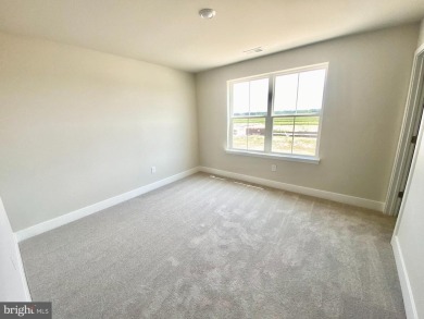 MOVE IN READY-FINISHED BASEMENT AND UPPER LEVEL!  Photos are of on Plantation Lakes Golf and Country Club in Delaware - for sale on GolfHomes.com, golf home, golf lot