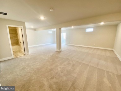 MOVE IN READY-FINISHED BASEMENT AND UPPER LEVEL!  Photos are of on Plantation Lakes Golf and Country Club in Delaware - for sale on GolfHomes.com, golf home, golf lot