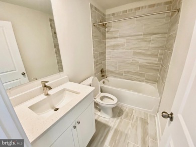 MOVE IN READY-FINISHED BASEMENT AND UPPER LEVEL!  Photos are of on Plantation Lakes Golf and Country Club in Delaware - for sale on GolfHomes.com, golf home, golf lot