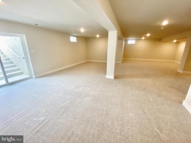 MOVE IN READY-FINISHED BASEMENT AND UPPER LEVEL!  Photos are of on Plantation Lakes Golf and Country Club in Delaware - for sale on GolfHomes.com, golf home, golf lot