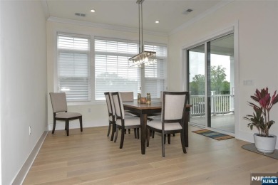 Experience refined living in this luxurious top-floor Cottage at on Edgewood Country Club in New Jersey - for sale on GolfHomes.com, golf home, golf lot