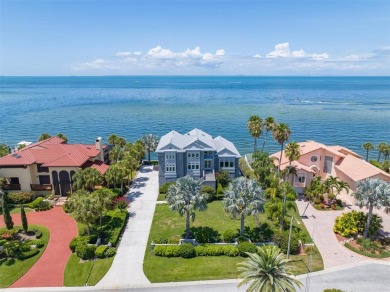 Welcome to your luxury oasis overlooking the serene waters of on Key Royale Club in Florida - for sale on GolfHomes.com, golf home, golf lot