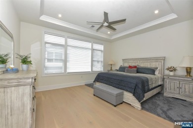 Experience refined living in this luxurious top-floor Cottage at on Edgewood Country Club in New Jersey - for sale on GolfHomes.com, golf home, golf lot