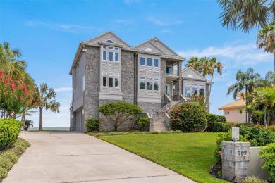 Welcome to your luxury oasis overlooking the serene waters of on Key Royale Club in Florida - for sale on GolfHomes.com, golf home, golf lot