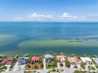 Welcome to your luxury oasis overlooking the serene waters of on Key Royale Club in Florida - for sale on GolfHomes.com, golf home, golf lot