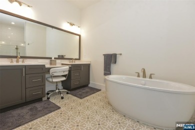 Experience refined living in this luxurious top-floor Cottage at on Edgewood Country Club in New Jersey - for sale on GolfHomes.com, golf home, golf lot