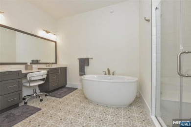 Experience refined living in this luxurious top-floor Cottage at on Edgewood Country Club in New Jersey - for sale on GolfHomes.com, golf home, golf lot
