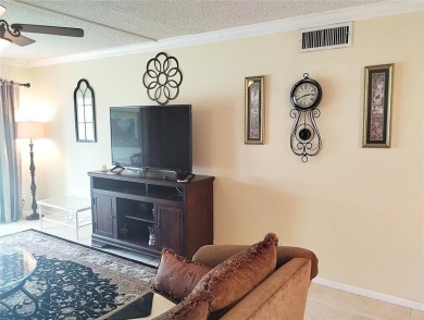 INVITING  2/2 DECORATED IN NEUTRAL SOFT COLORS, SO WELCOMING! on Wynmoor Golf Course in Florida - for sale on GolfHomes.com, golf home, golf lot