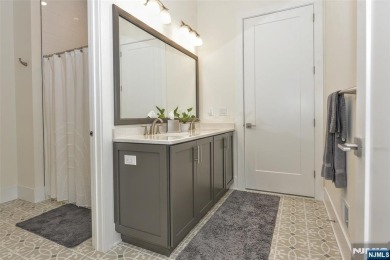 Experience refined living in this luxurious top-floor Cottage at on Edgewood Country Club in New Jersey - for sale on GolfHomes.com, golf home, golf lot