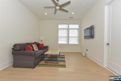 Experience refined living in this luxurious top-floor Cottage at on Edgewood Country Club in New Jersey - for sale on GolfHomes.com, golf home, golf lot