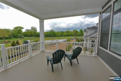 Experience refined living in this luxurious top-floor Cottage at on Edgewood Country Club in New Jersey - for sale on GolfHomes.com, golf home, golf lot