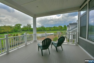 Experience refined living in this luxurious top-floor Cottage at on Edgewood Country Club in New Jersey - for sale on GolfHomes.com, golf home, golf lot