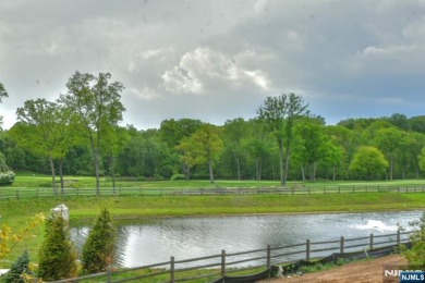 Experience refined living in this luxurious top-floor Cottage at on Edgewood Country Club in New Jersey - for sale on GolfHomes.com, golf home, golf lot