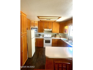 Charming Ranch-Style Home Near Golf Course!Welcome to this on Mt. Graham Municipal Golf Course in Arizona - for sale on GolfHomes.com, golf home, golf lot
