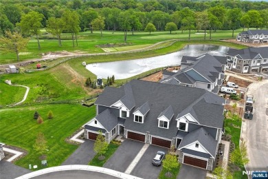 Experience refined living in this luxurious top-floor Cottage at on Edgewood Country Club in New Jersey - for sale on GolfHomes.com, golf home, golf lot