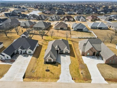 Experience executive living in the prestigious, guarded on Pecan Plantation Country Club in Texas - for sale on GolfHomes.com, golf home, golf lot