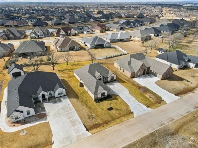 Experience executive living in the prestigious, guarded on Pecan Plantation Country Club in Texas - for sale on GolfHomes.com, golf home, golf lot