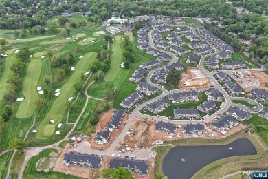 Experience refined living in this luxurious top-floor Cottage at on Edgewood Country Club in New Jersey - for sale on GolfHomes.com, golf home, golf lot