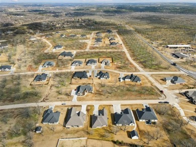 Experience executive living in the prestigious, guarded on Pecan Plantation Country Club in Texas - for sale on GolfHomes.com, golf home, golf lot