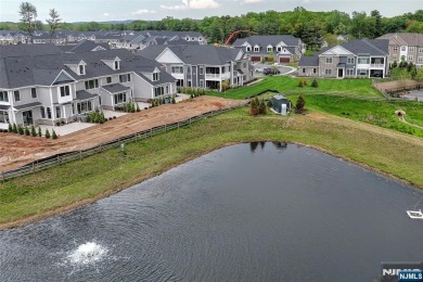 Experience refined living in this luxurious top-floor Cottage at on Edgewood Country Club in New Jersey - for sale on GolfHomes.com, golf home, golf lot