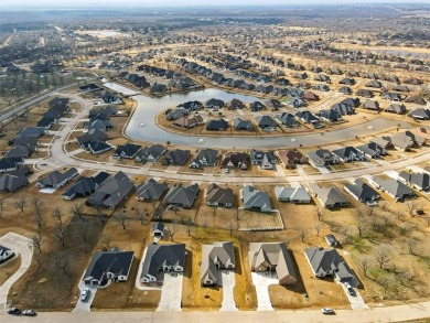 Experience executive living in the prestigious, guarded on Pecan Plantation Country Club in Texas - for sale on GolfHomes.com, golf home, golf lot