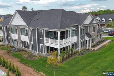 Experience refined living in this luxurious top-floor Cottage at on Edgewood Country Club in New Jersey - for sale on GolfHomes.com, golf home, golf lot