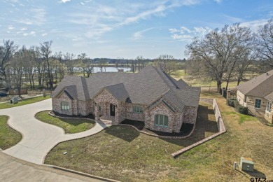 This gorgeous craftsman style home is ready for you to move on Mount Pleasant Country Club in Texas - for sale on GolfHomes.com, golf home, golf lot