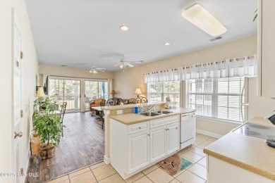 Discover easy coastal living in this spacious condo located in on Sea Trail Golf Resort in North Carolina - for sale on GolfHomes.com, golf home, golf lot