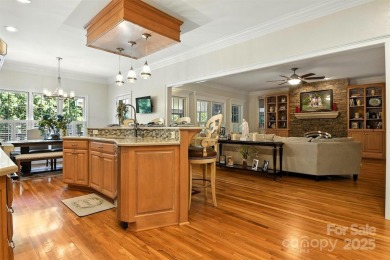 Stunning executive brick home in the gated Rock Barn Golf on Rock Barn Golf and Spa in North Carolina - for sale on GolfHomes.com, golf home, golf lot
