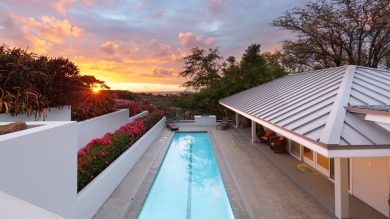 Nestled behind the gates of the exclusive Mauna Kea Resort on Mauna Kea Resort in Hawaii - for sale on GolfHomes.com, golf home, golf lot