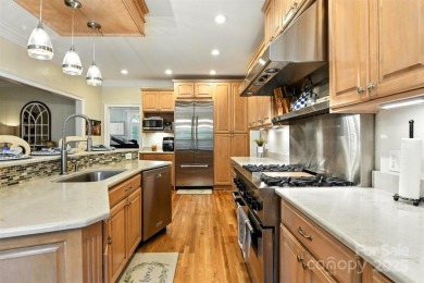 Stunning executive brick home in the gated Rock Barn Golf on Rock Barn Golf and Spa in North Carolina - for sale on GolfHomes.com, golf home, golf lot